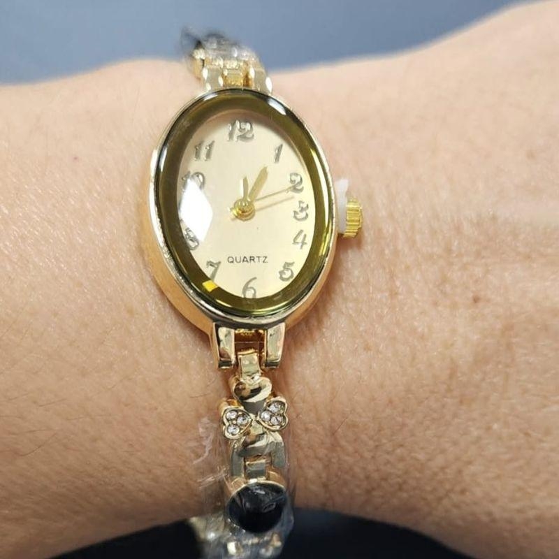 Relógio Dourado Oval